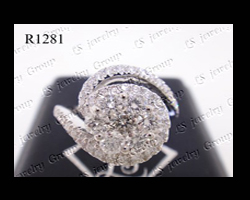 แหวนเพชรกระจุกก้านไขว้ (Diamonds Ring) เพชร Heart & Arrow – Russian Cut