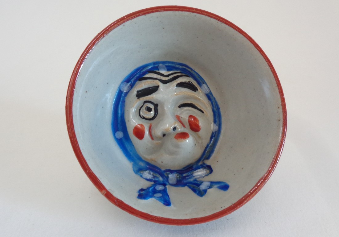 Sake cup with Hyottoko mask face Art pottery
