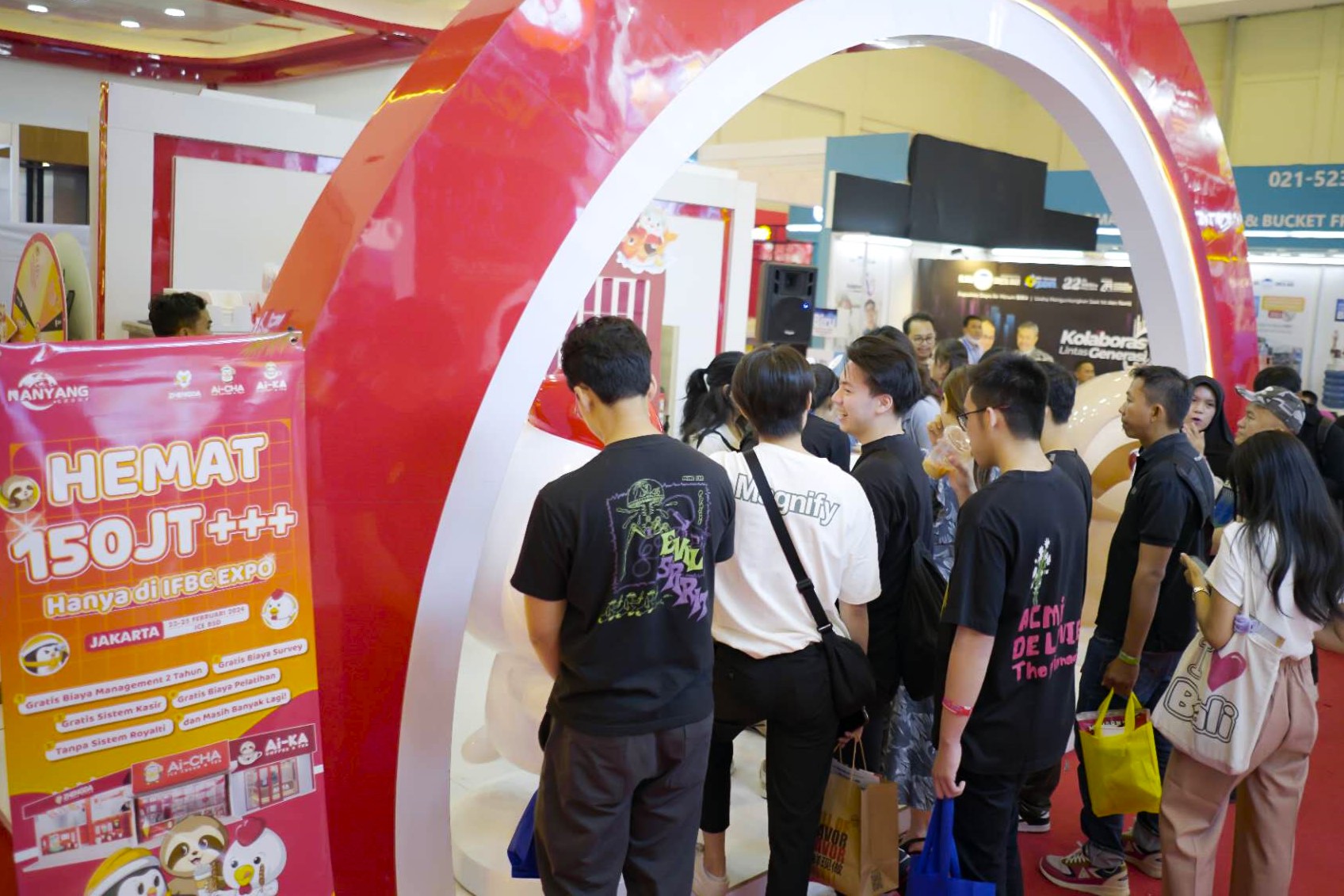 a lot of people at the Ai-KA, Ai-CHA, and ZHENGDA booth