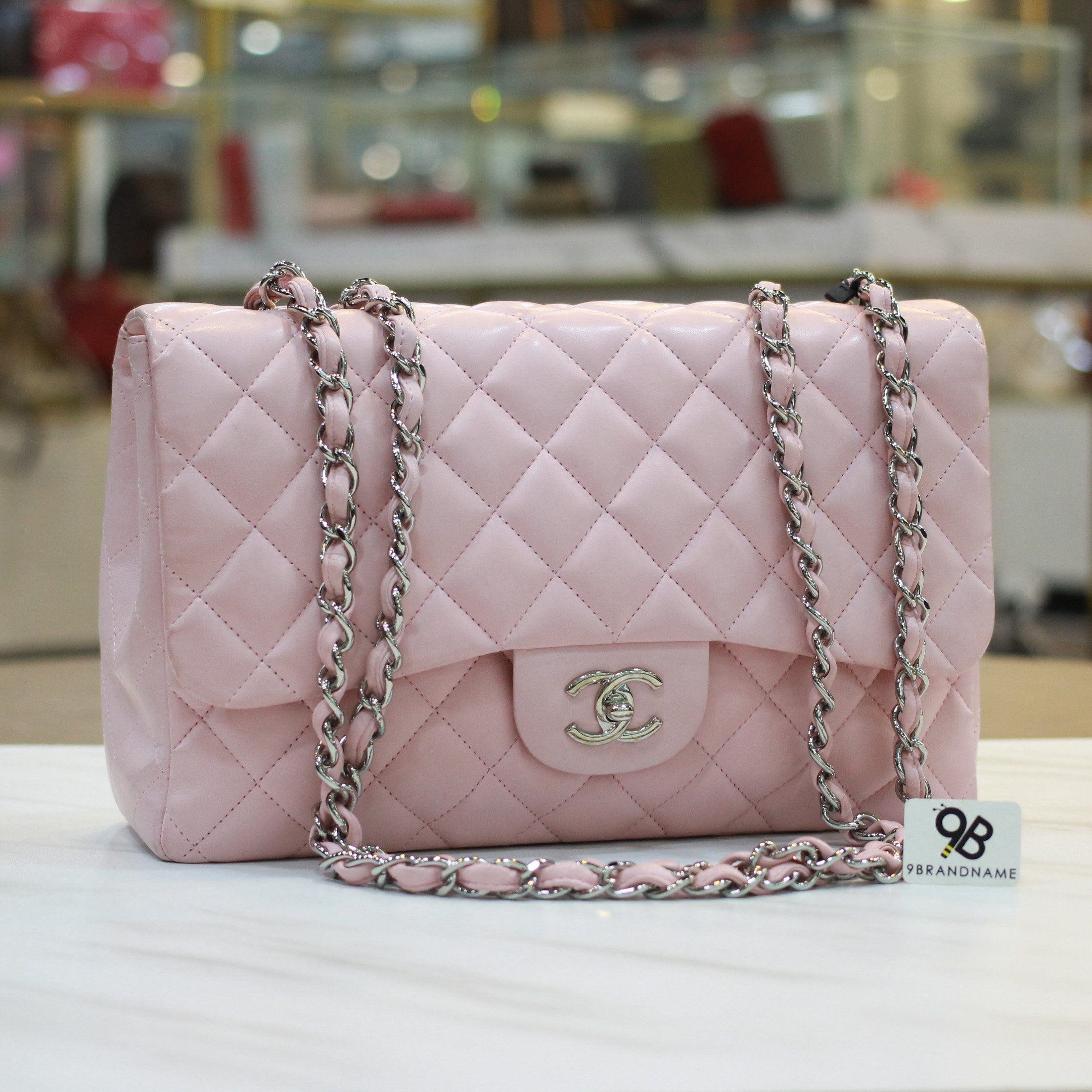 pink chanel flap bag with top handle