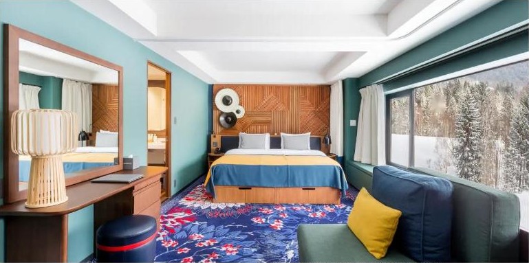 ห้องพักโทนฟ้าเขียวของ Club Med Tomamu