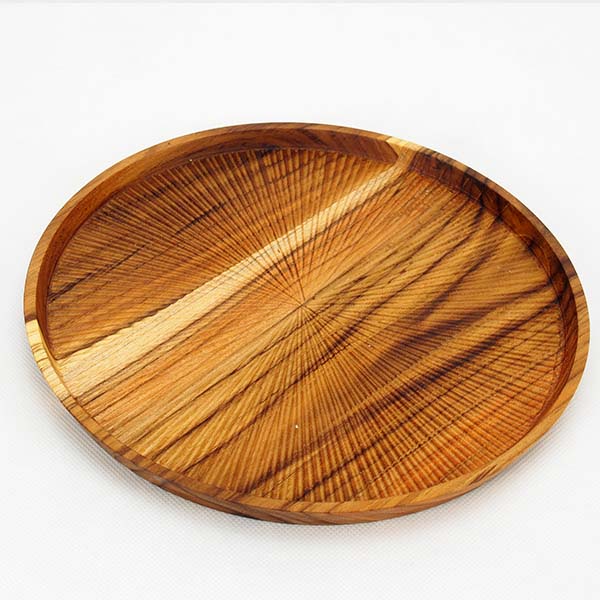 Round plate carved designs 26 cm.