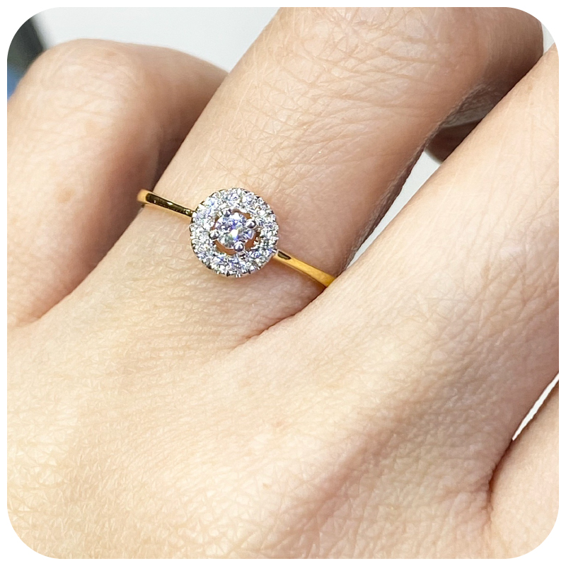 Litile lady surrounded by diamonds Ring
