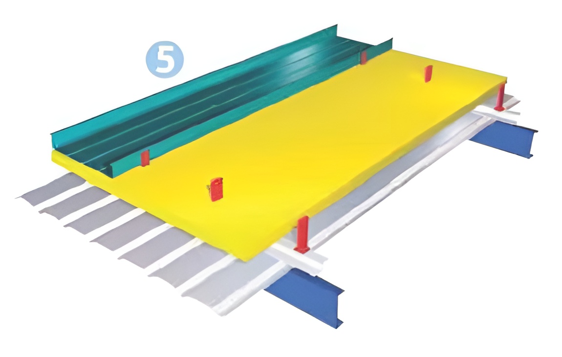 Laying LYSAGHT® FLEX-LOK™ sheet on the clip with hand seamer on the end of rib. Laying LYSAGHT® FLEX-LOK™ sheet on the clip with hand seamer on the end of rib.