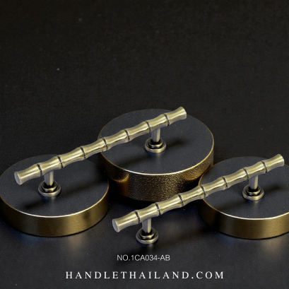 มือจับ (ซิงค์) ลายไผ่ สีดำ-เหลือง 64 mm. 1CA034-AB