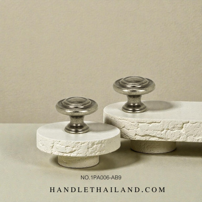 ปุ่มจับ (ซิงค์) สีดำ-เงิน 32x24 mm. 1PA006-019