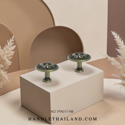 ปุ่มจับโบราณ (ซิงค์) หน้าดอกไม้ ดำ-เหลือง 32x25 mm. 1PA017