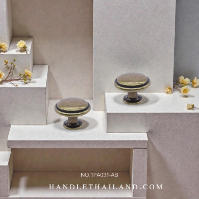 ปุ่มจับโบราณ ดำ-เหลือง (ซิงค์) 28 mm.