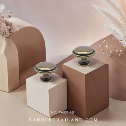 ปุ่มจับโบราณ (ซิงค์) ดำ-เหลือง 28x21 mm. 1PA031-AB