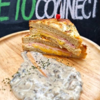 Grilled ham cheese sandwich with truffle sauce