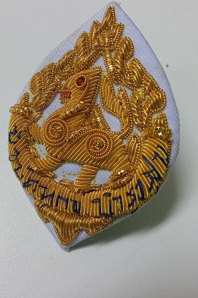 หน้าสิงห์ติดหมวกข้าราชการ ขาว