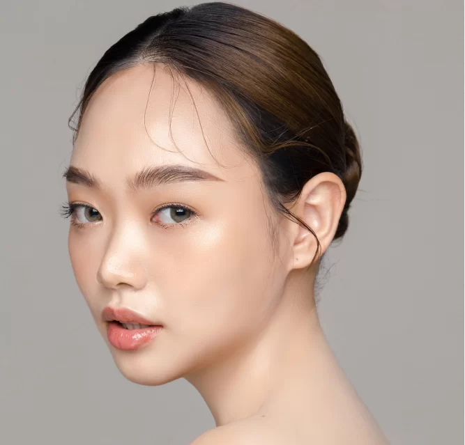 beautiful-young-asian-woman-model-with-perfect-clean-fresh-skin-grey-background-face-care-facial-treatment-cosmetology-plastic-surgery-lovely-girl-portrait-studio_1.webp
