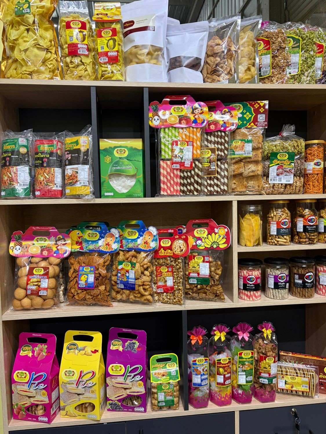 Pennapa Thai snacks on the shop shelves in Pak Chong
