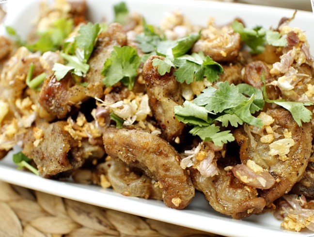 ข้าวไส้อ่อนผัดกระเทียมพริกไทย