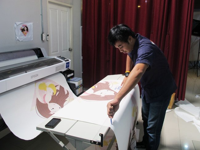 Process of Screening artwork on pillow