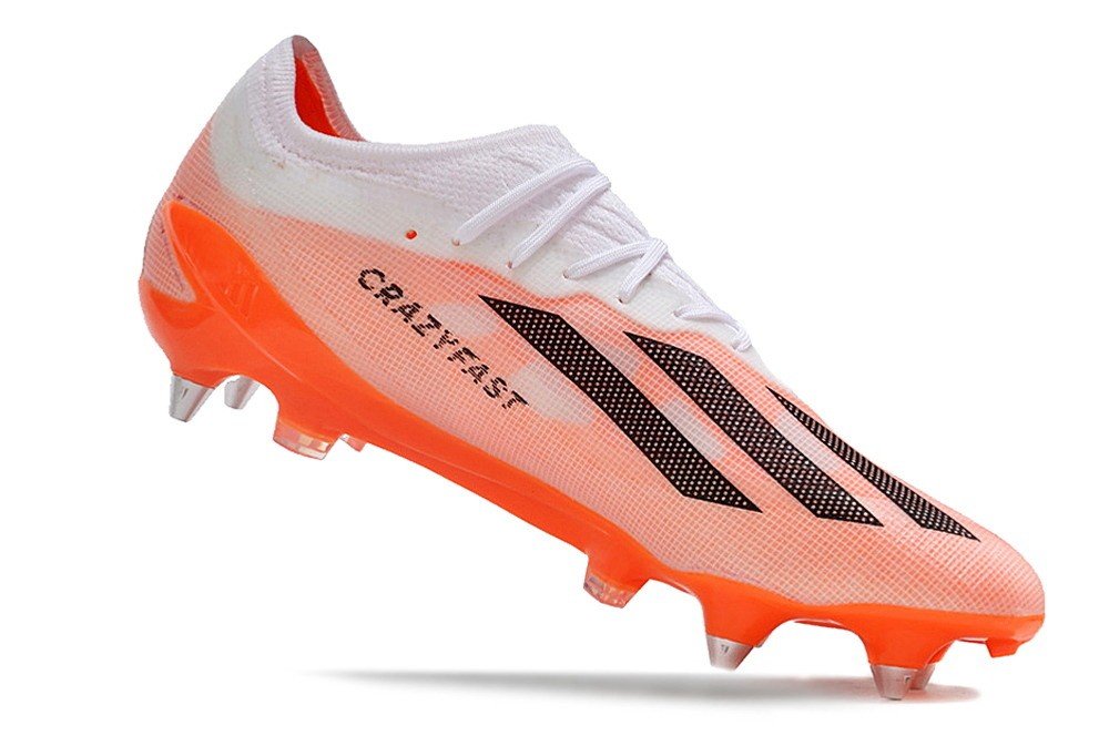 Adidas cleats orange sale