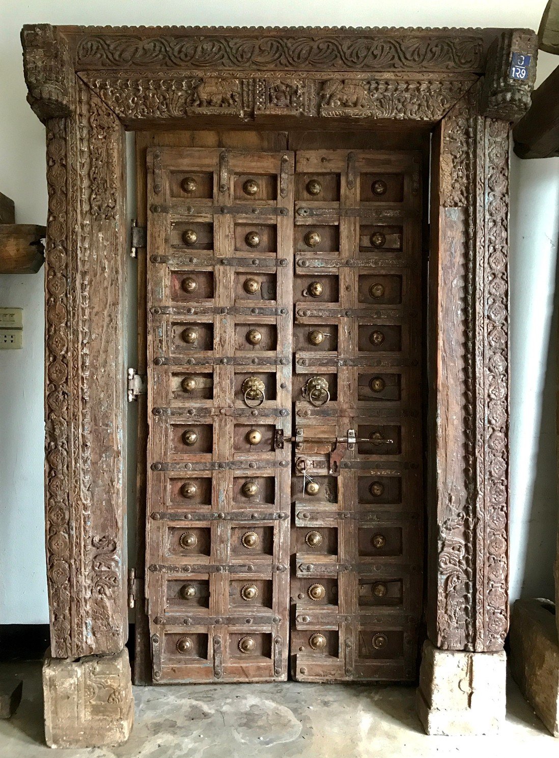 L51 Old Door With Carved Elephants and Brass Umbrellas
