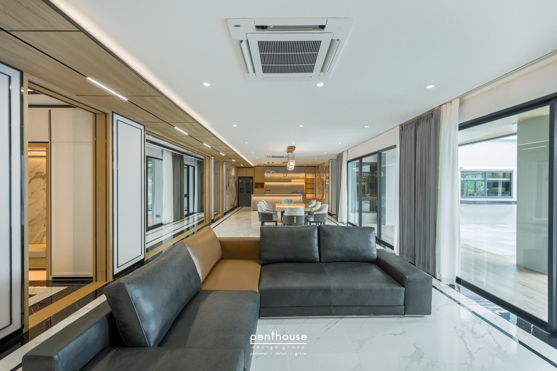 Open-plan living and dining spaces in Theera House