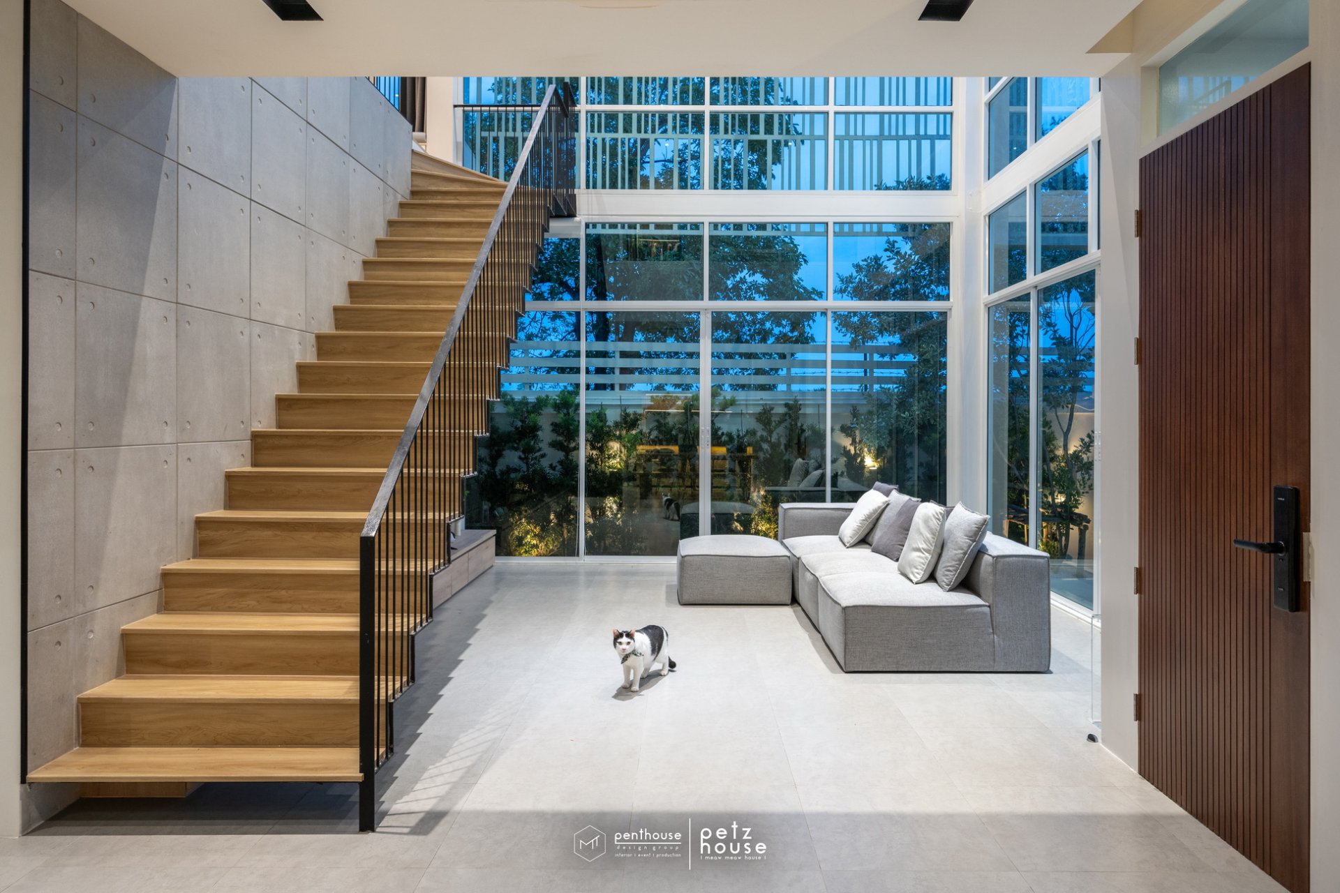 Stair hall and tall glazing in Petz House