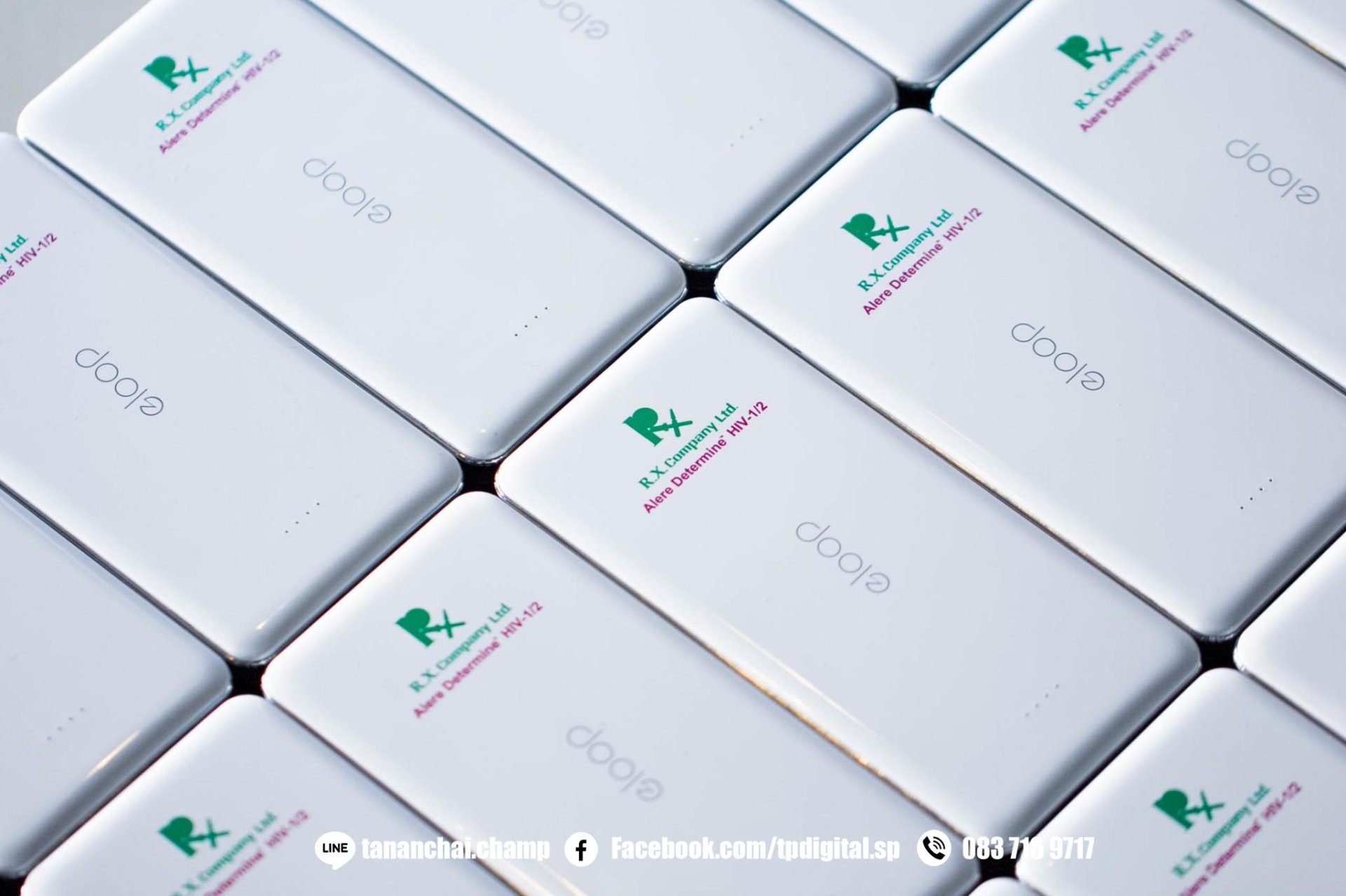 พิมพ์พาวเวอร์แบงค์ พิมพ์โลโก้ลงบนพาวเวอร์แบงค์ สีขาว ยี่ห้อ eloop ลาย R.X. Company Ltd.
