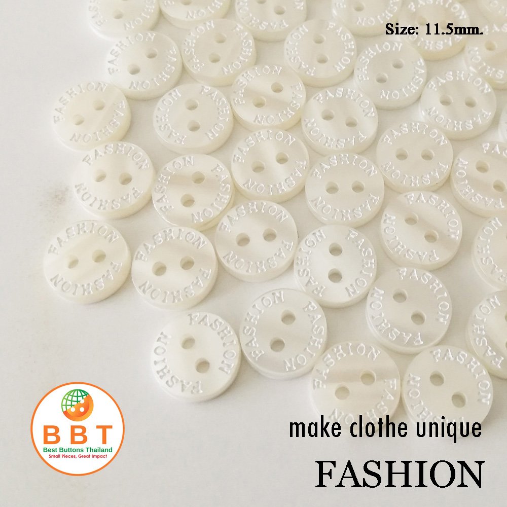 Engraving Buttons "FASHION" on Ivory Buttons