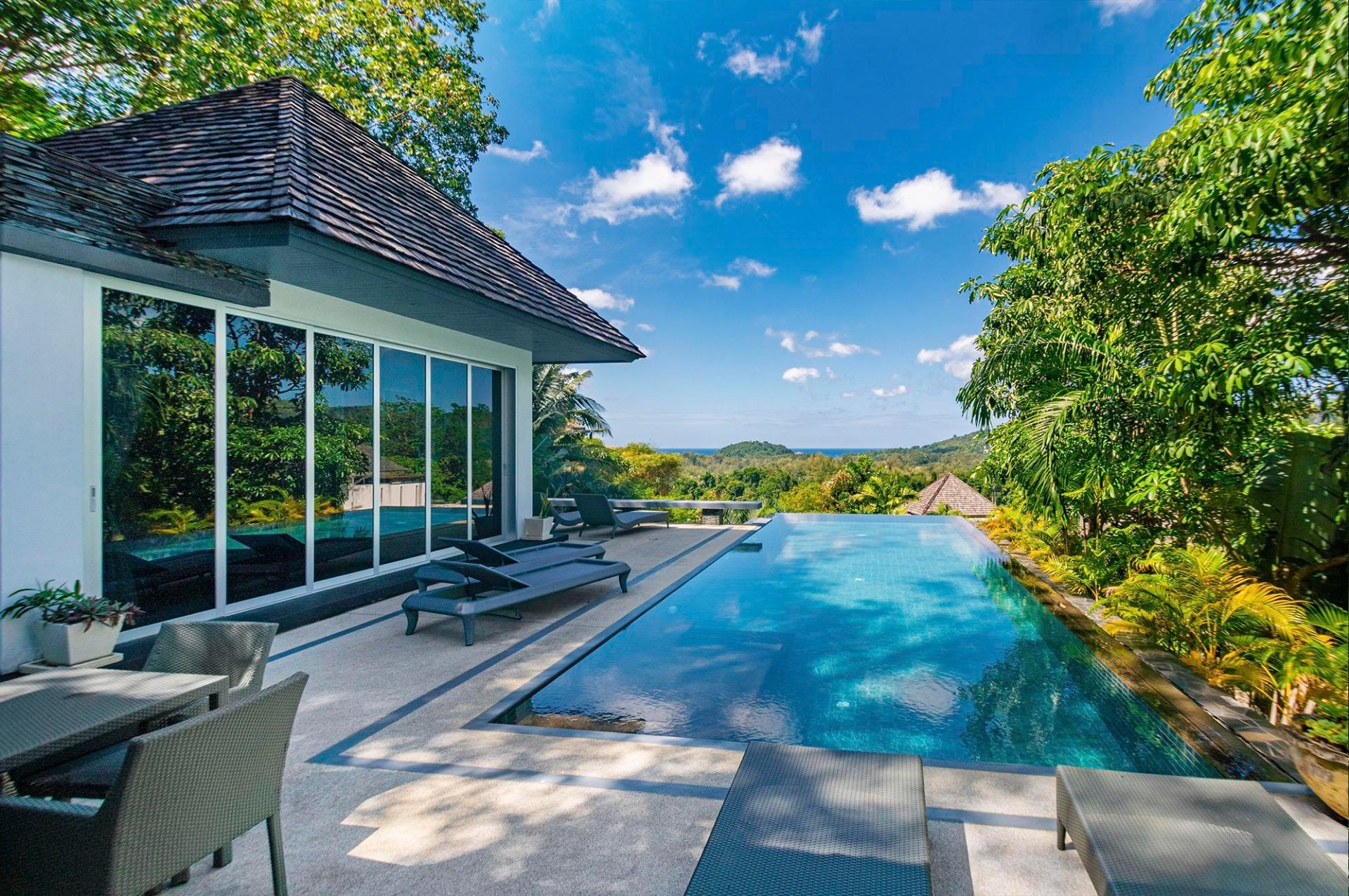 An infinity pool looking out over the sea from a PK Life villa in Cherng Talay