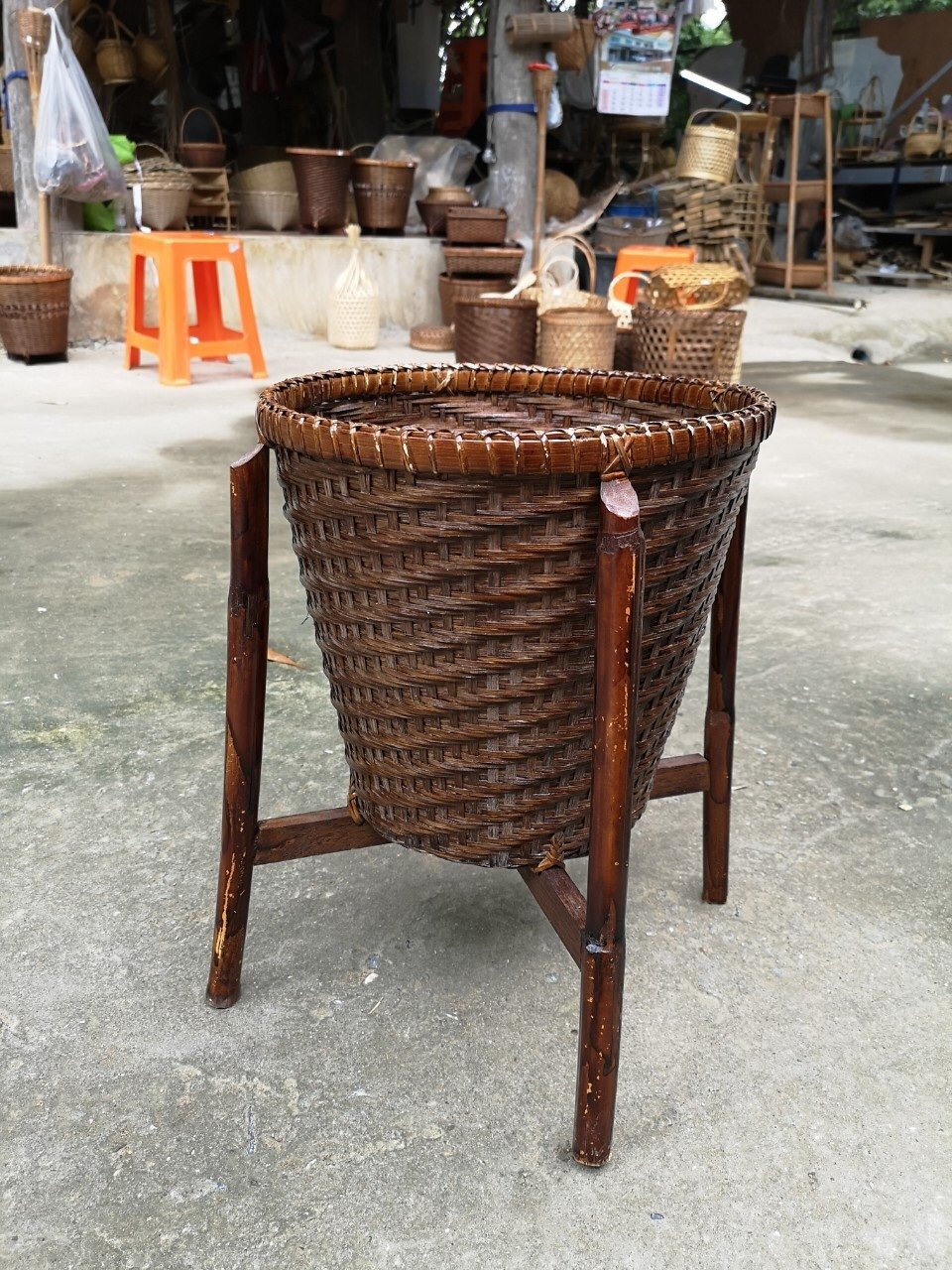 Basket with tall stand