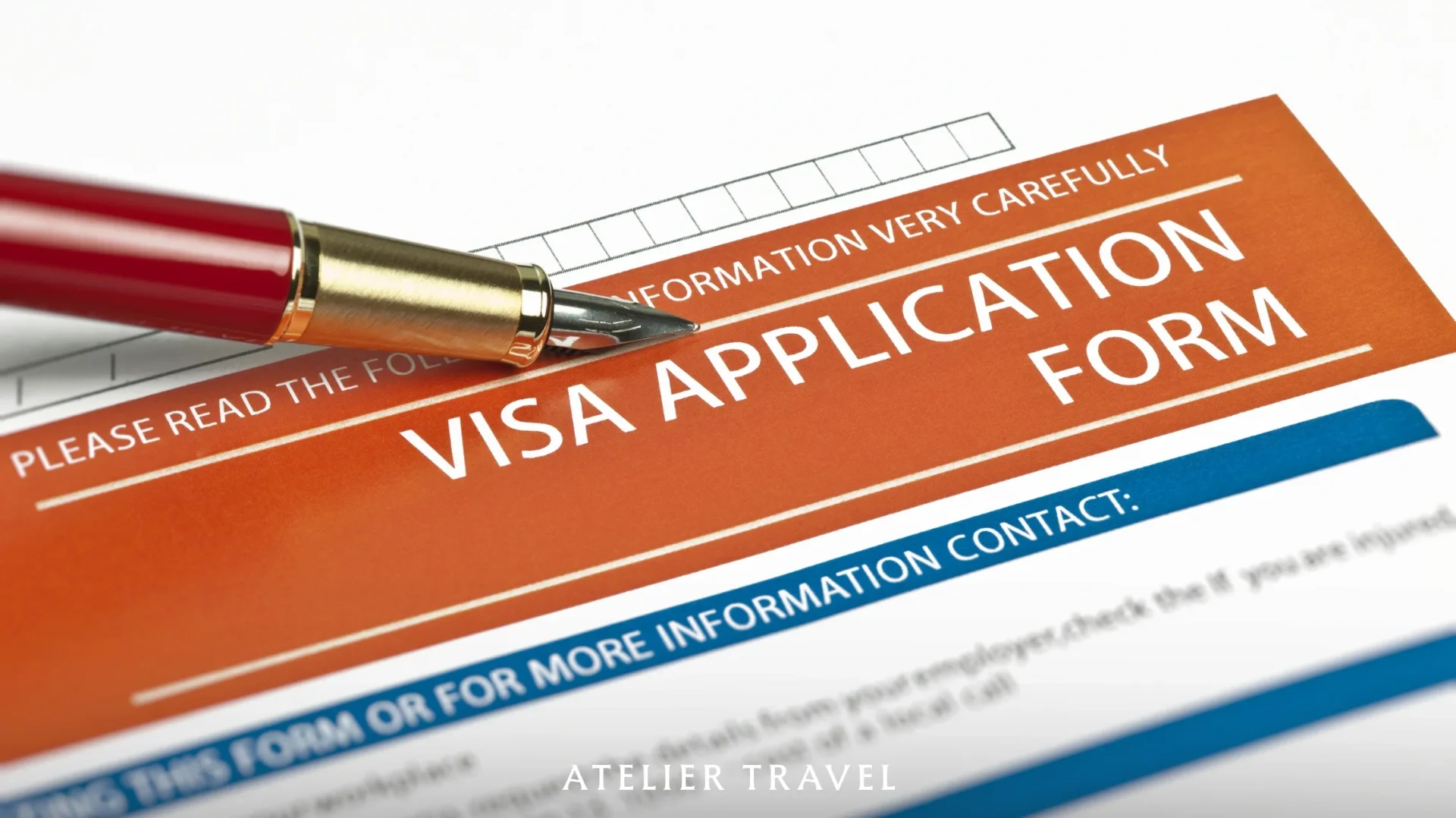 ปากกาวางบนแบบฟอร์ม Visa Application Form