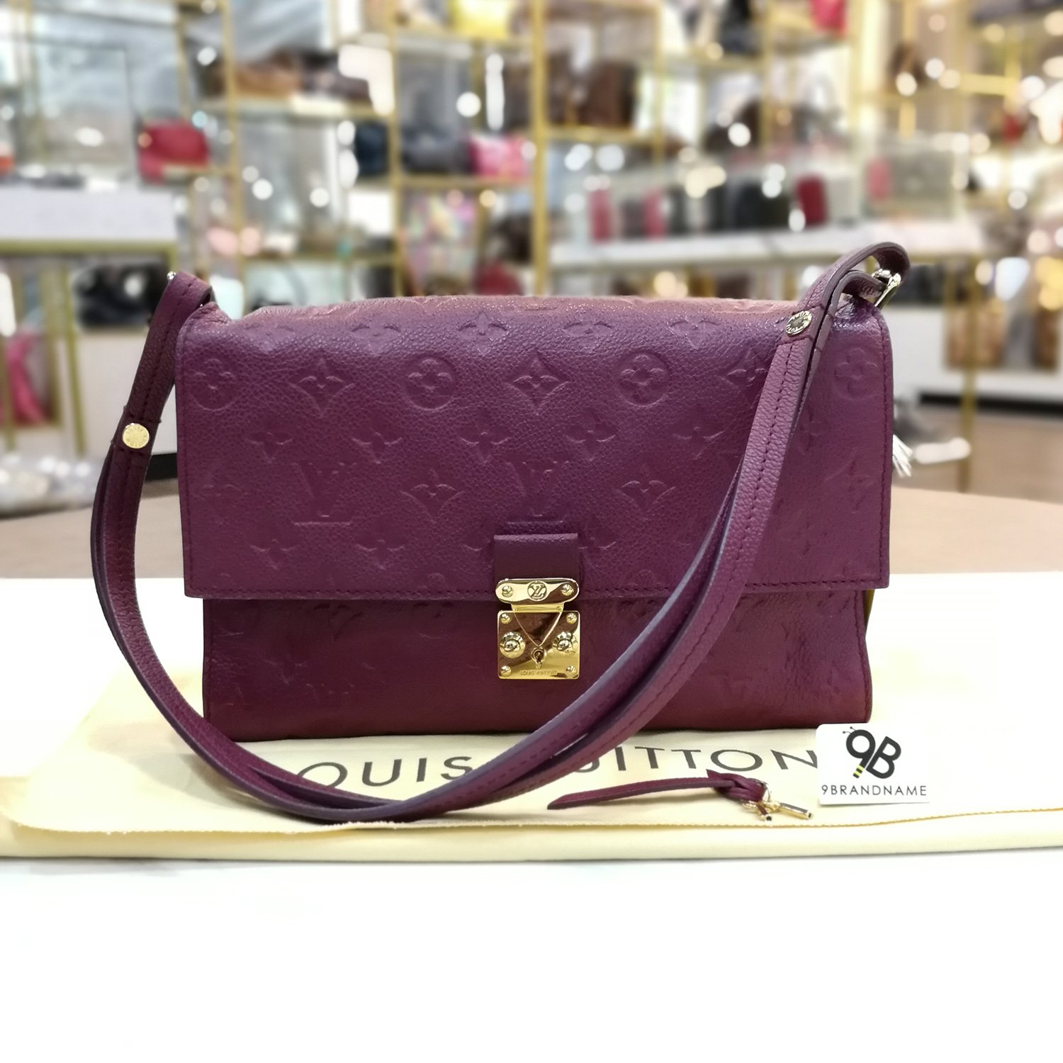 Louis Vuitton Grape Monogram Empreinte Leather St Germain MM Bag