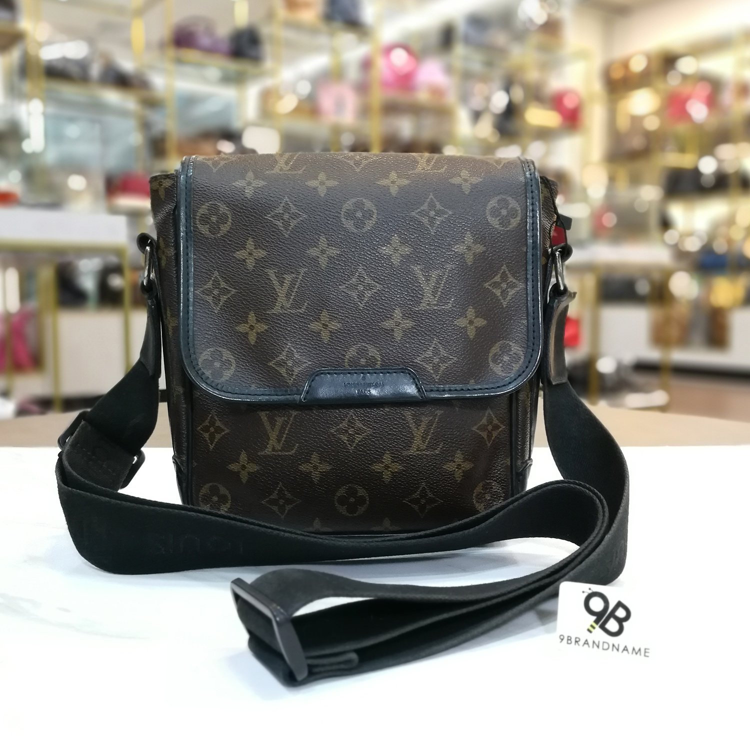 Louis Vuitton Brown Monogram Macassar Coated Canvas Bass PM Silver  Hardware, 2009 Available For Immediate Sale At Sotheby's