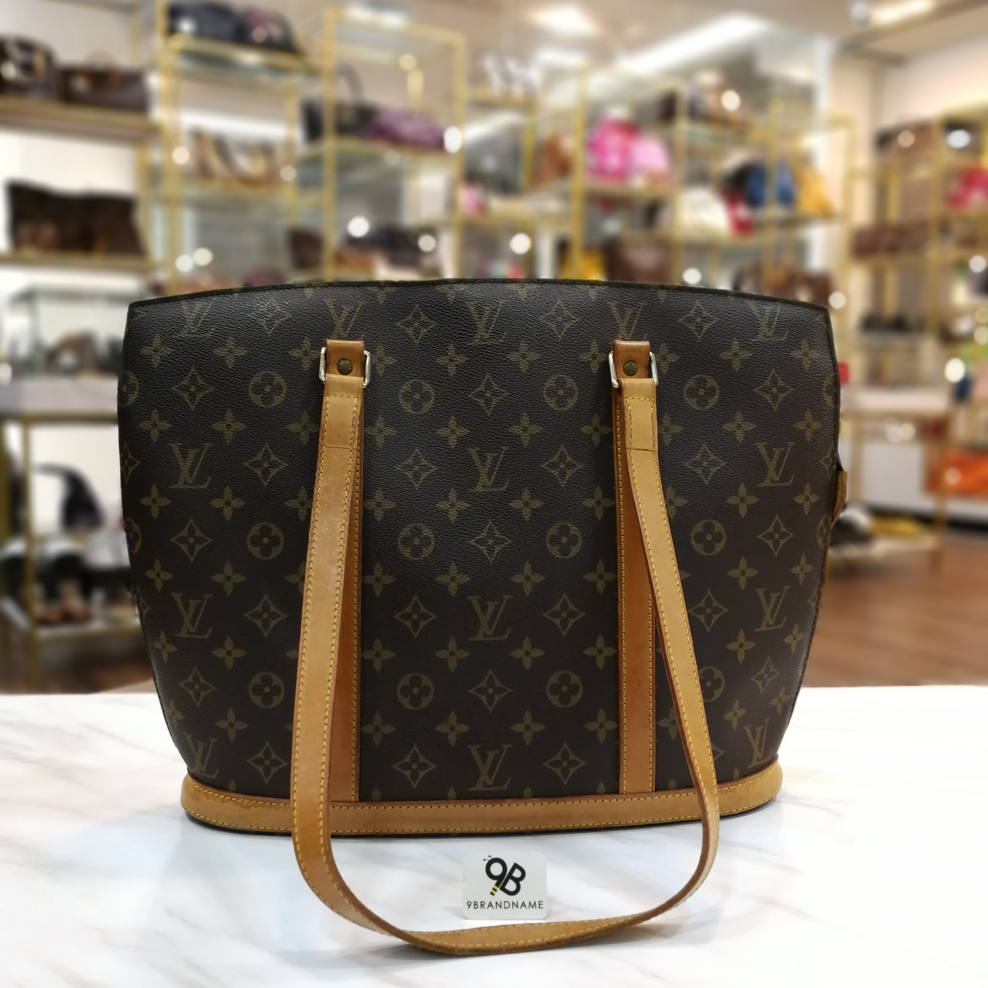 Babylone handbag Louis Vuitton Brown in Synthetic - 37735675