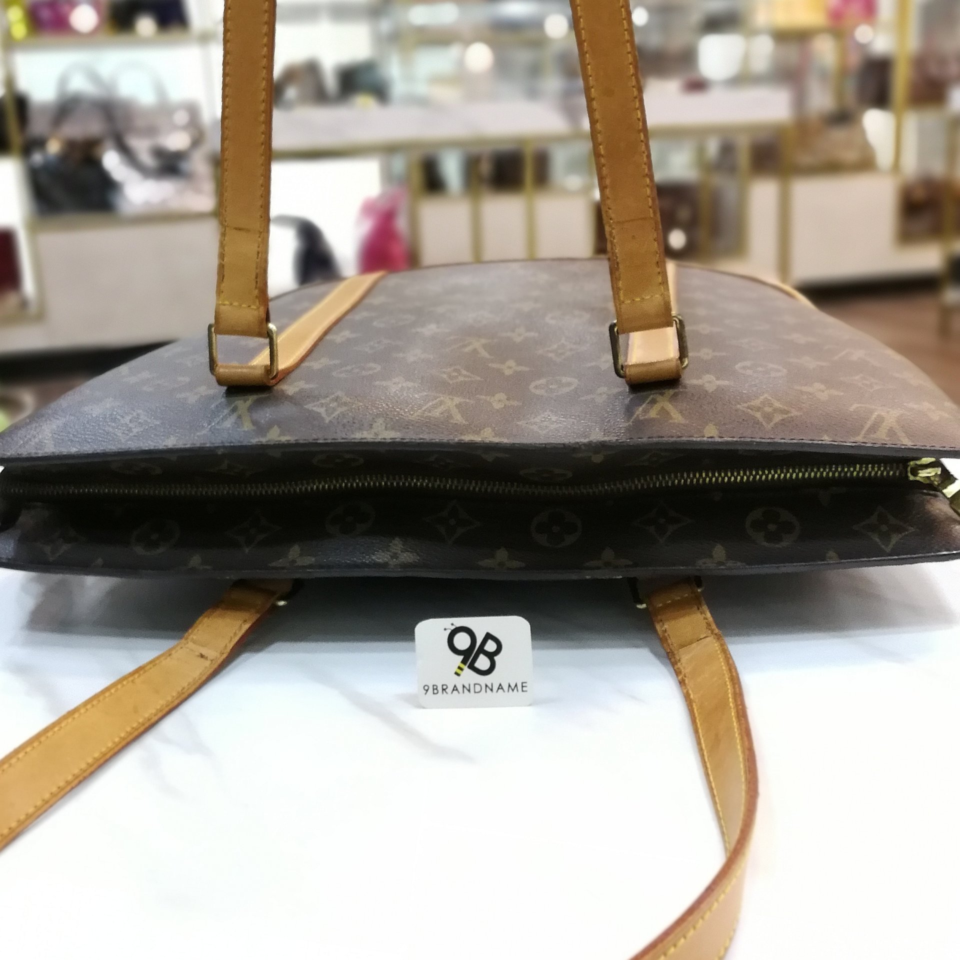Babylone vintage cloth handbag Louis Vuitton Brown in Cloth - 24440668