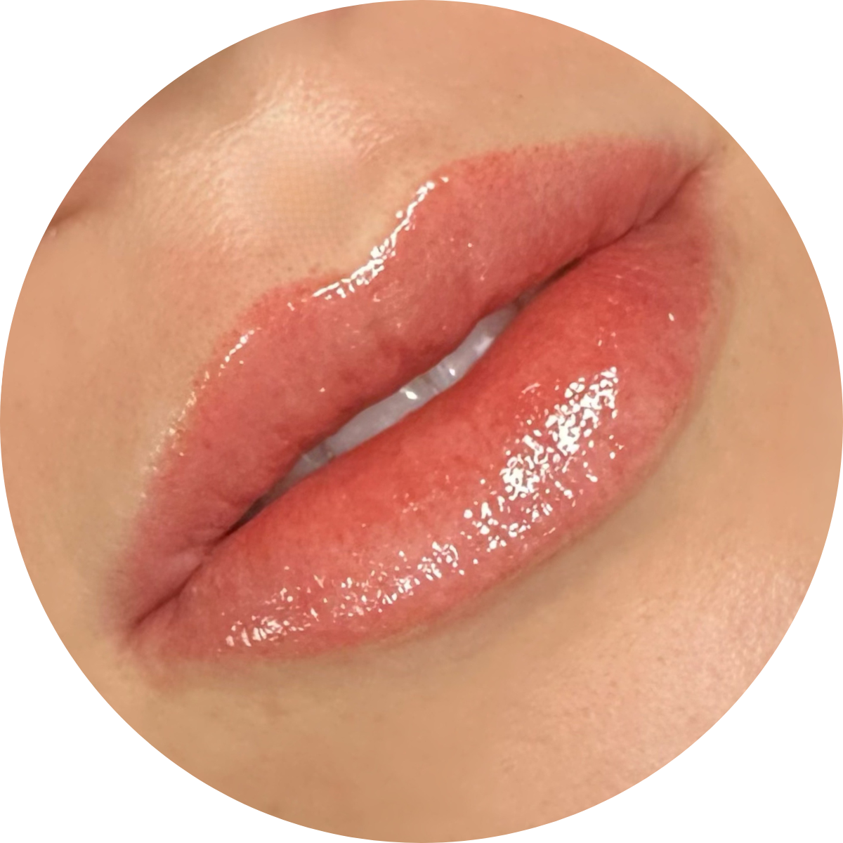 Lip blush tattoo by Madam Studio Bangkok, enhancing natural lip color with soft, lasting pigments.