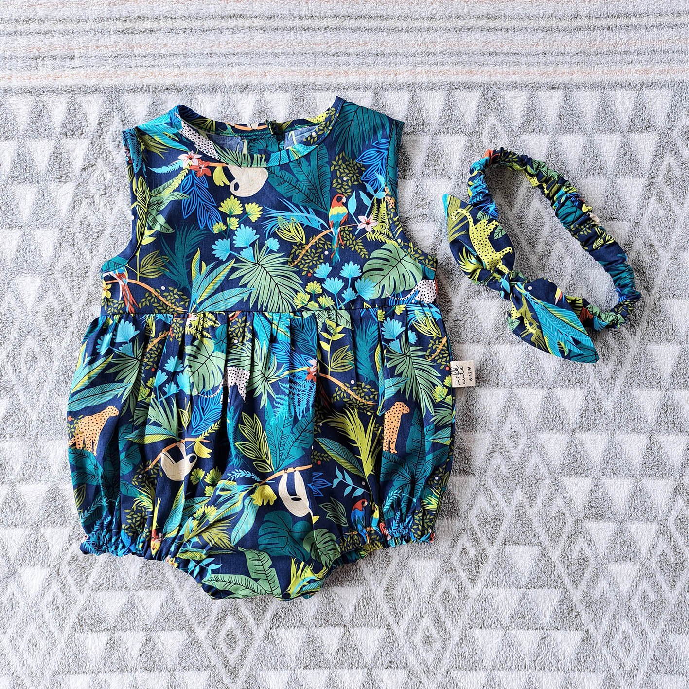 BUTTONS BACK DARK BLUE JUNGLE ROMPER 100% PRINTED COTTON*HEADBAND NOT INCLUDED