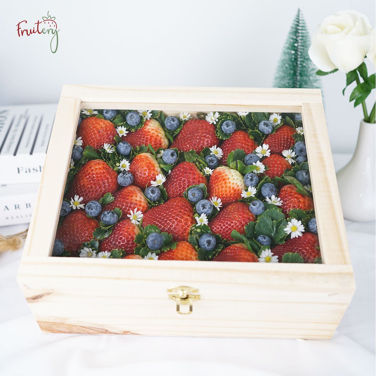strawberry and blueberry in wood box