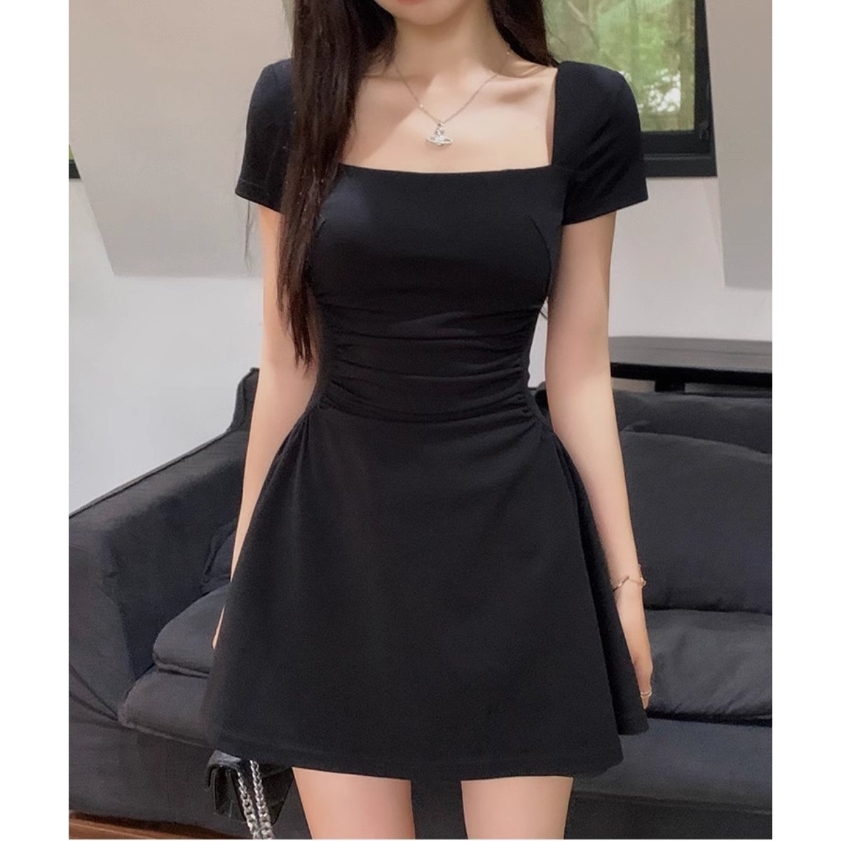 Mimi Mini Dress, a short princess-style dress with a waist that hides your figure.