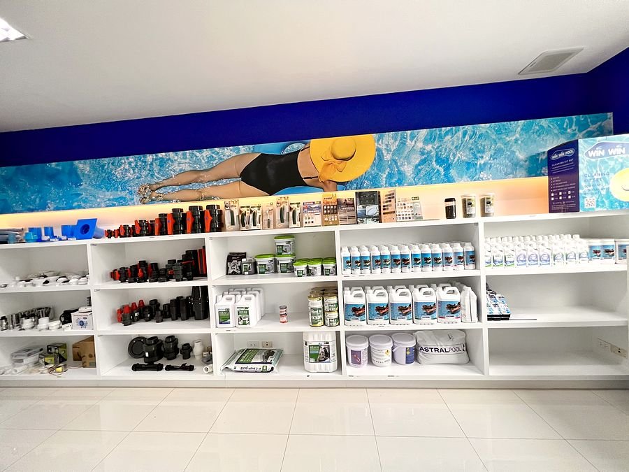 Shelves of pool chemicals and maintenance supplies