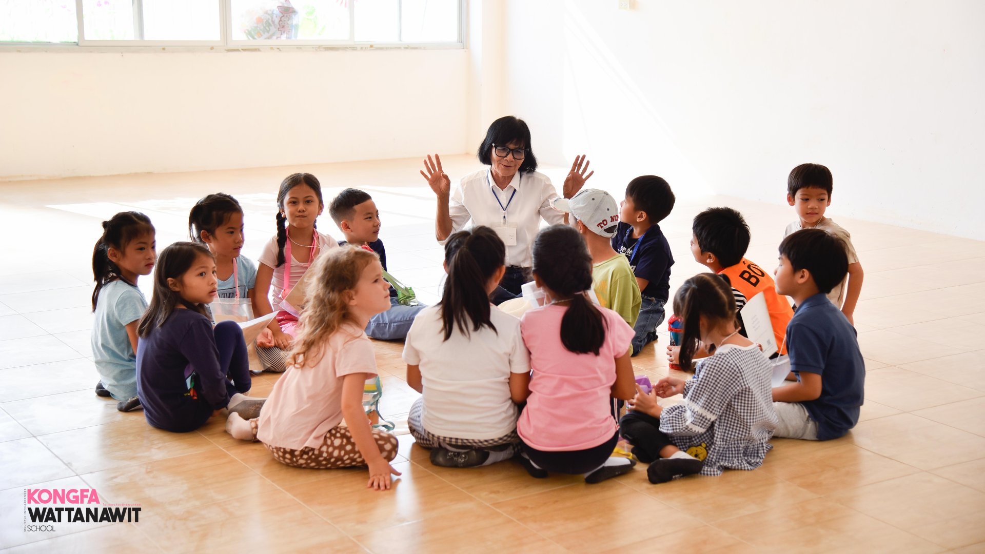 Children and teachers sharing ideas in a group circle