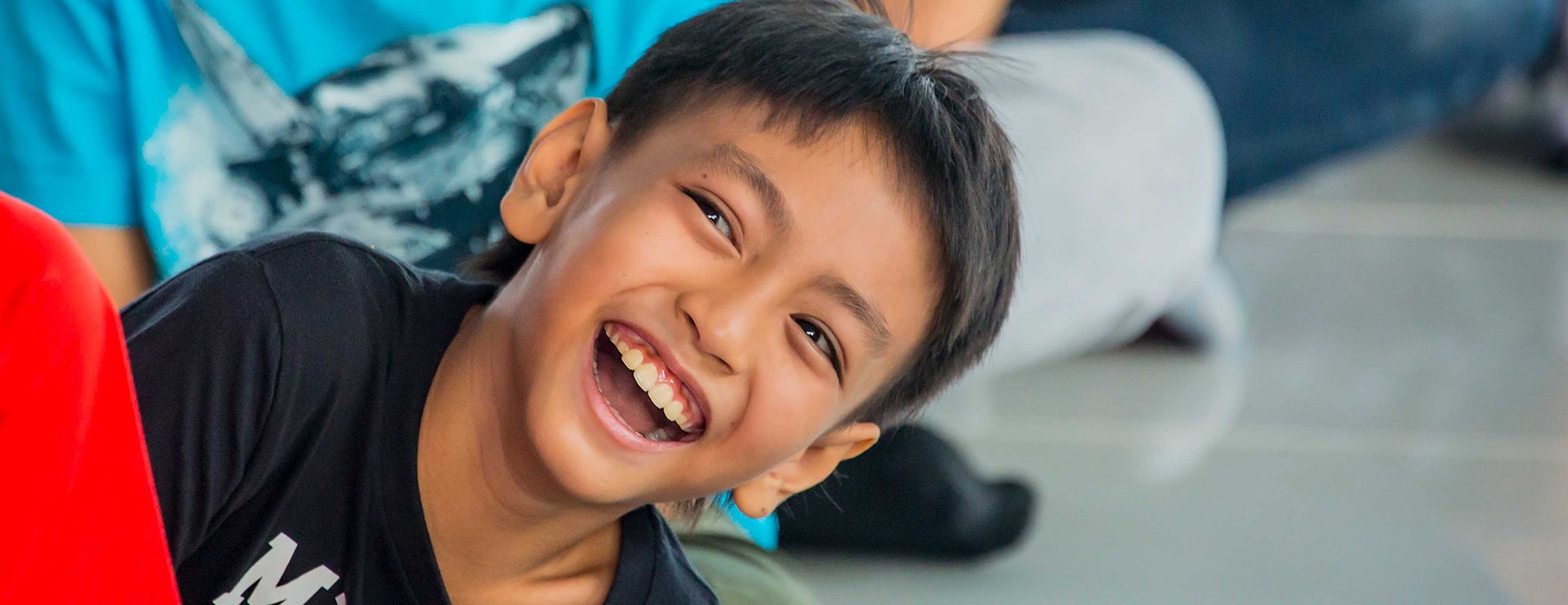 Children smiling during a school activity