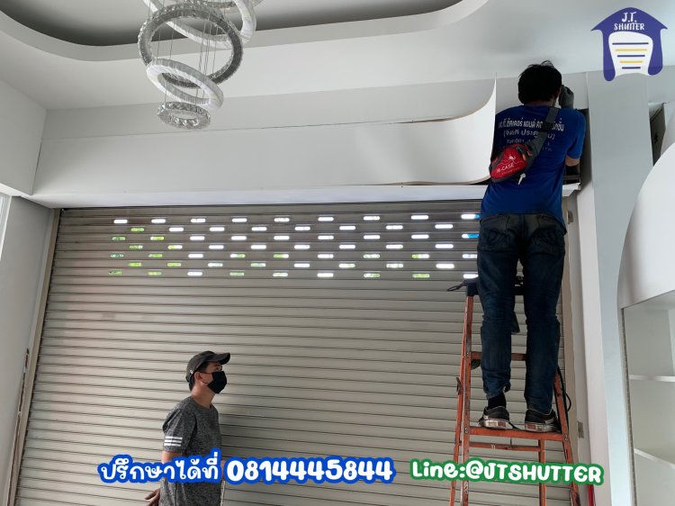 ช่างซ่อมประตูม้วนยกหนัก ซ่อมประตู ตั้งสปริง