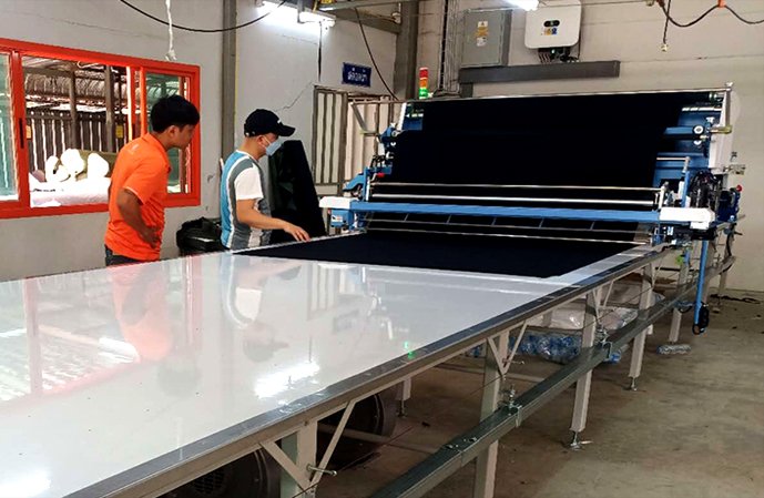 เครื่องปูผ้า