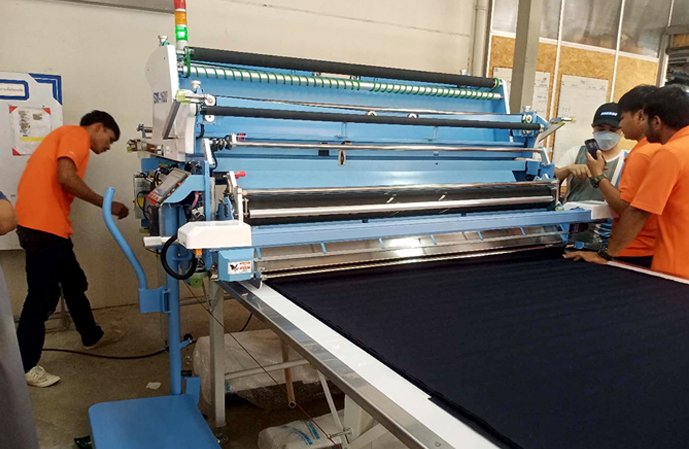 เครื่องปูผ้า