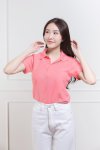 เสื้อโปโลหญิง "ทรงเว้าเอว" สีชมพูแคนดี้