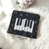 Multipurpose Fabric Pouch with Piano and Music Note Design