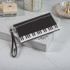กระเป๋าใส่ของเอนกประสงค์ลายเปียโน มาพร้อมสายคล้องมือ