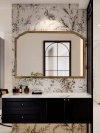 A wall-mounted vintage-style bathroom mirror, designed for makeup and everyday grooming. Showcasing a luxurious French aesthetic, this large mirror is perfect for placement above the sink and comes equipped with intelligent features, including an anti-fog