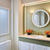 Bring timeless charm to your home with this French vintage-style wall mirror in a soft cream finish