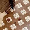 Caramel-colored vintage floral tiles