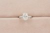 Oval Cut Diamond With Hidden Halo and Three Sides Pavé I