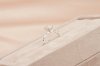 Emerald Cut Diamond With Polka Dot Setting Solitaire Ring